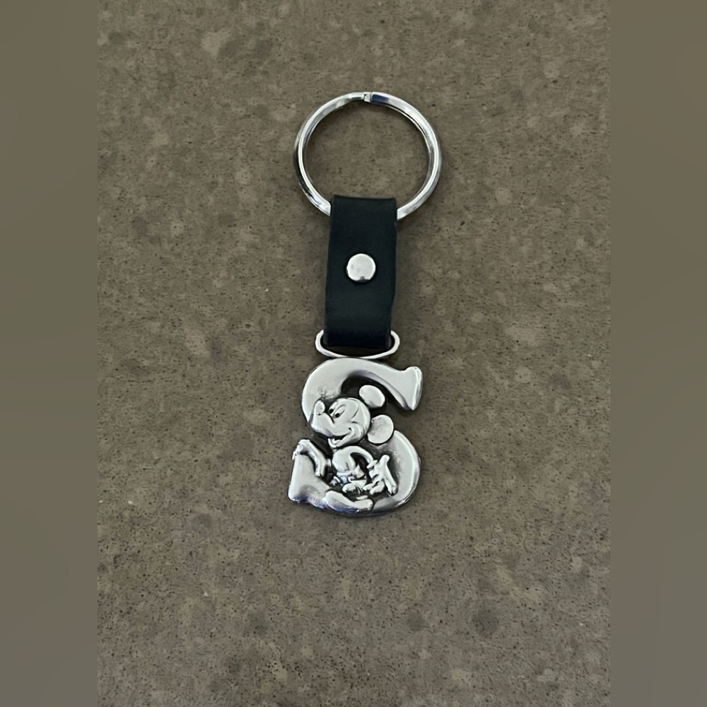 Like new collectors item “S” initial Mickey Mouse Disney key fob.
